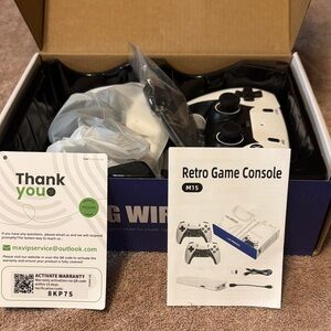 Retro Game Console with Black and White Controllers